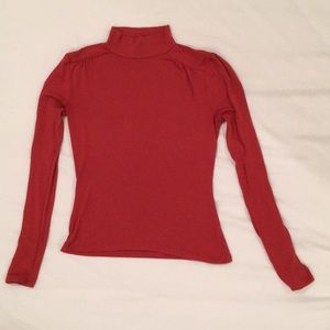 Rust orange mock neck top